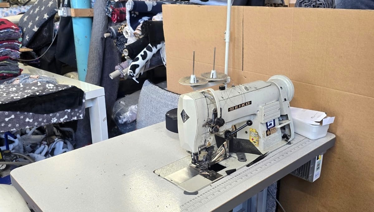 Industrial sewing equipment at a workstation